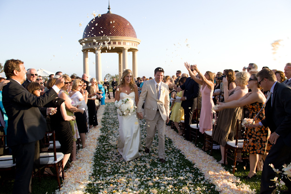 ceremony exit  with pink rose petals - real wedding photo by Los Angeles photographer Jay Lawrence Goldman